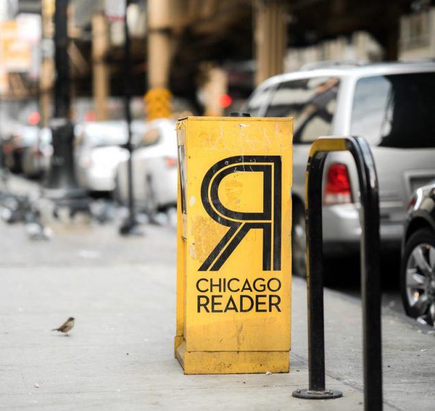 vehicle parked near Chicago Reader can at daytime