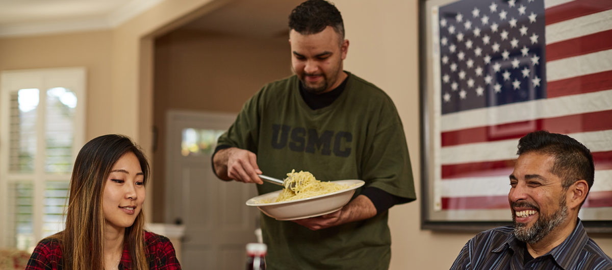 veterans enjoying dinner together