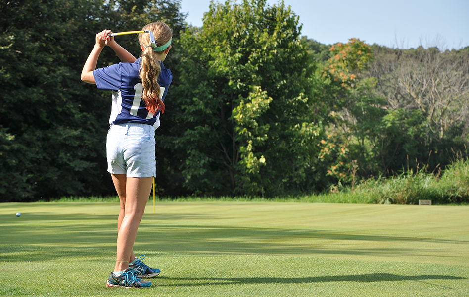 Cantigny Youth Links, young girl swinging golf club